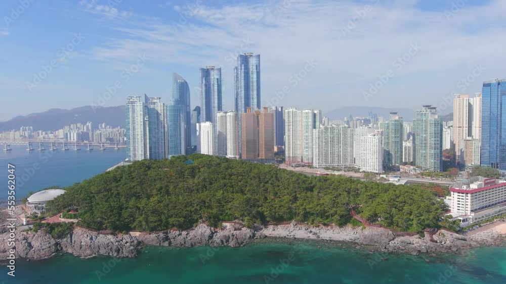 Busan: Aerial view of city in South Korea, skyline of Haeundae district with modern high-rise buildings (skyscrapers), sunny day with blue sky - landscape panorama of Eastern Asia from above Busan: Aerial view of city in South Korea, skyline of Haeundae district with modern high-rise buildings (skyscrapers), sunny day with blue sky - landscape panorama of Eastern Asia from above