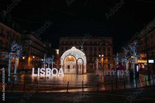 Christmas lights on a gazebo with a Lisboa sign lit up in a city square in Chiado and Bairro Alto districts; Lisbon, Estremadura, Portugal photo