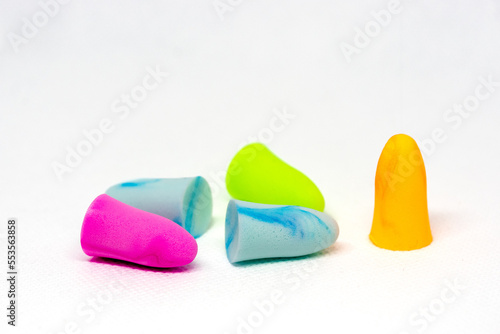 Set of colorful earplugs isolated on white background with space for copytext