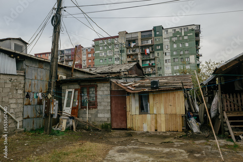 Old shabby houses in the slum district photo