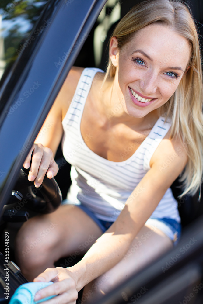 beautiful woman cleaning her car beautiful woman cleaning her car