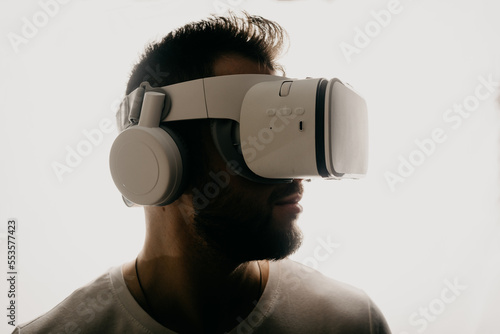 Man with VR headset isolated on white background