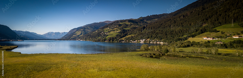 The panorama with Kitzsteinhorn(Tauern Alps) and Zell am See in the Zell am See-Kaprun region, Austrian Alps, Salcburgerland