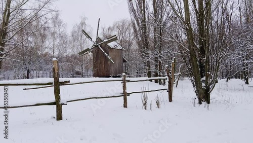 Vintage windmill in Mamajeva Sloboda Cossack Village, Kyiv, Ukraine photo