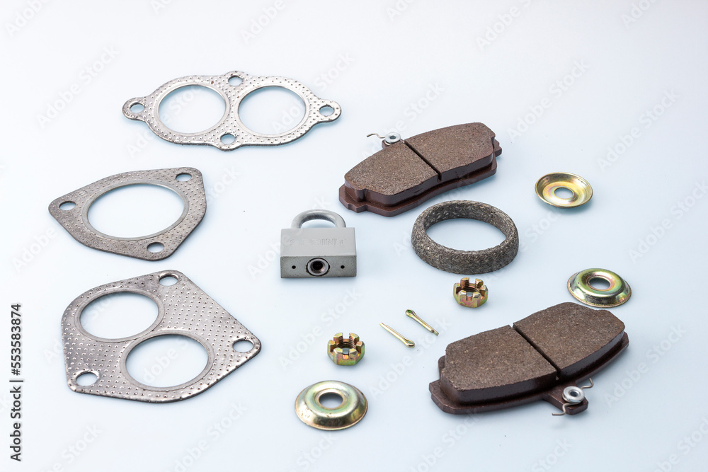 details of components and components of mechanisms for the repair of components and assemblies of the car on a white milky background. details of components and components of mechanisms for the repair of components and assemblies of the car on a white milky background.