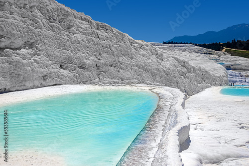 View of natural travertine pools and terraces in Pamukkale. Cotton castle in southwestern Turkey