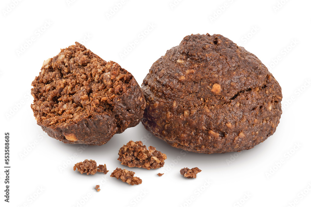chocolate cookie with kerob, banana, cashew, sunflower seeds and coconut paste isolated on white background. Healthy food, gluten-free, flour-free chocolate cookie with kerob, banana, cashew, sunflower seeds and coconut paste isolated on white background. Healthy food, gluten-free, flour-free