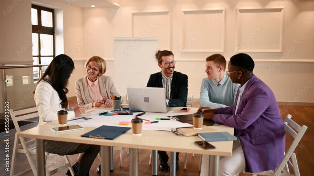 Business multiracial team on a meeting in an office Business multiracial team on a meeting in an office