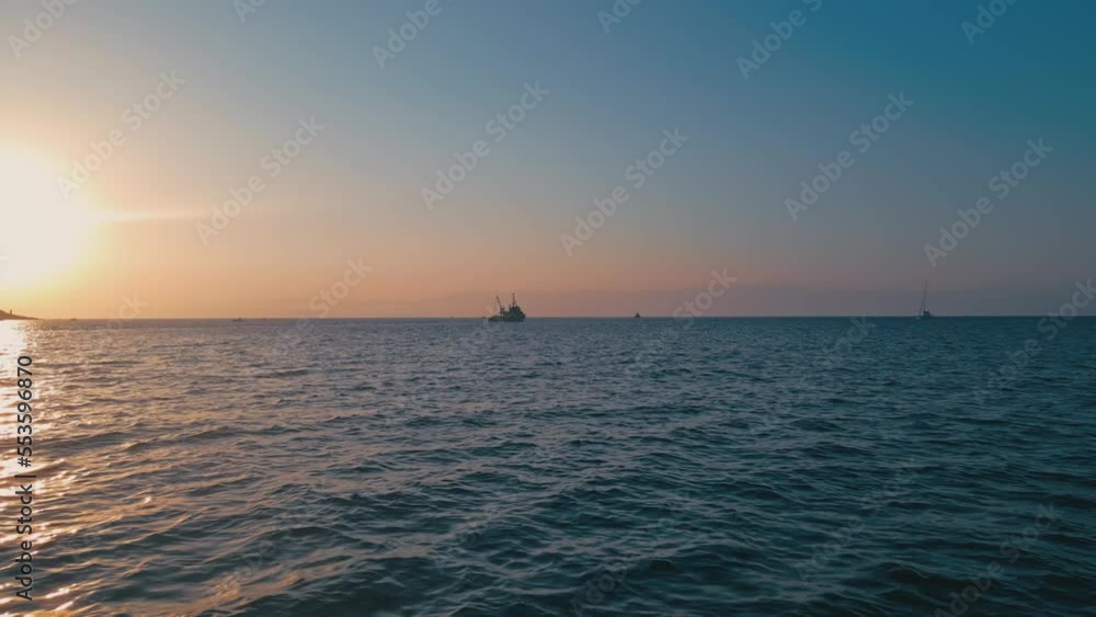 Fishing boat catching fish aerial view in the middle of the sea Fishing boat catching fish aerial view in the middle of the sea