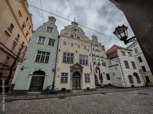 Architecture of the Old Town in Riga, Latvia. Latvian and Ukrainian flags on the building. No people. Three brothers house.