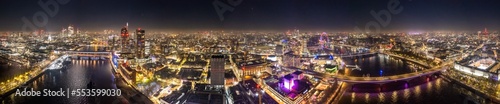 Epic night aerial view of the London, River Thames, London Eye, Westminster. Panorama cityscape