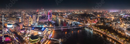 Epic night aerial view of the London, River Thames, London Eye, Westminster. Panorama cityscape © gormakuma