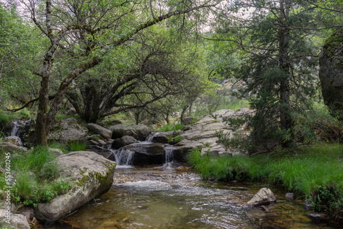 Waterfall in Rascafría on the purgatory route in the mountains of Madrid.