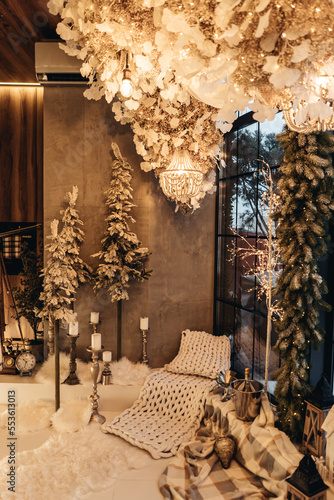 Christmas decor in the kitchen in a vintage style.  gingerbread house and cookies