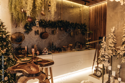 Christmas decor in the kitchen in a vintage style.  gingerbread house and cookies