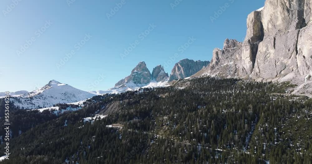 Aerial of beautiful and epic winter landscape, revealing Sassolungo mountain Aerial of beautiful and epic winter landscape, revealing Sassolungo mountain