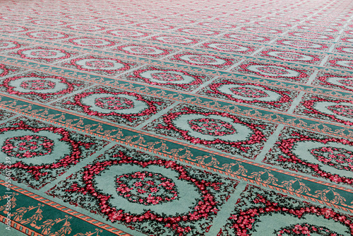 Infinite prayer rugs in Omar Ali Saifuddien Mosque in Brunei. photo