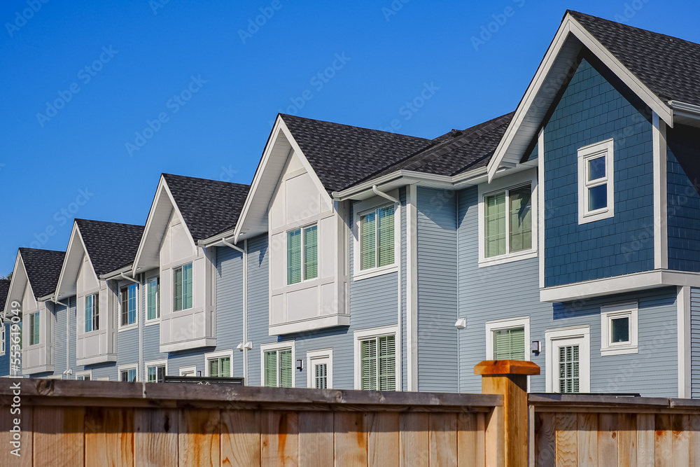 Home Exterior design of residential fronts. Neighborhood new modern houses. Canadian modern residential architecture