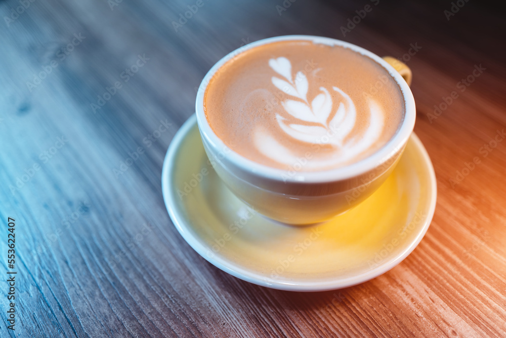 fresh tasty cappuccino or latte coffee with milky foam on wooden table in cafe fresh tasty cappuccino or latte coffee with milky foam on wooden table in cafe