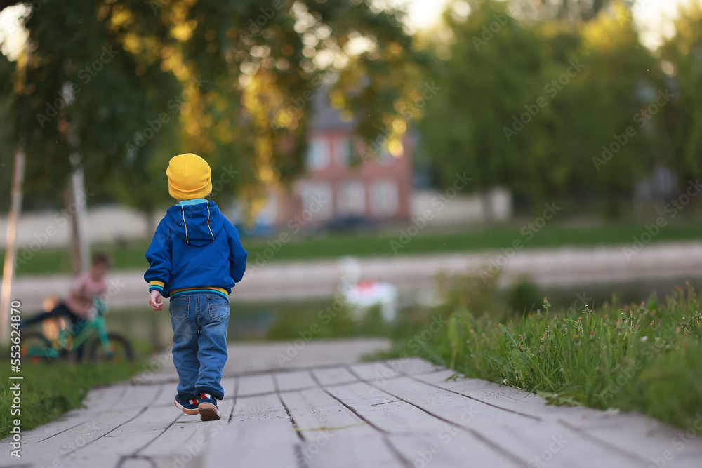 autumn park walk boy, childhood happiness autumn park walk boy, childhood happiness
