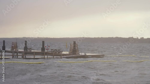 Floating Deck at Public Swimming Area on Stormy Day - Static photo