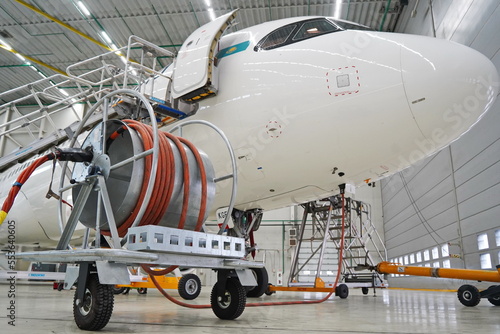 Astana, Kazakhstan - 10.17.2022 : Airbus A321 aircraft of Air Astana airlines in an engineering hangar under repair.