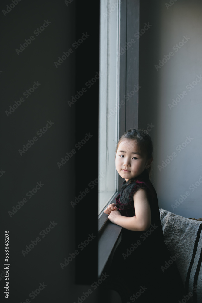 Girl in window light Girl in window light