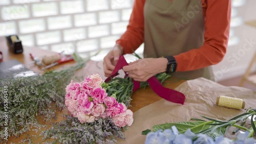 Startup successful sme small business entrepreneur owner asian woman standing table with flowers at florist shop service job. Portrait of asian girl successful owner environment friendly banner