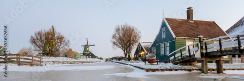 Photography Snow at the Zaanse Schans windmill village during winter with snow landscape in