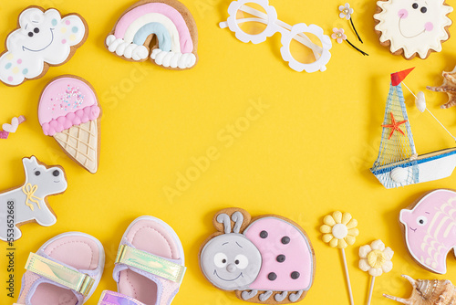 Bright creative layout made of cute summer symbols with copy space on yellow background. Top view, Flat lay. Creative summer concept