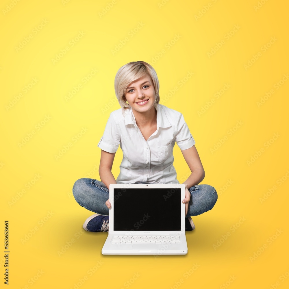 Happy young girl using laptop Happy young girl using laptop