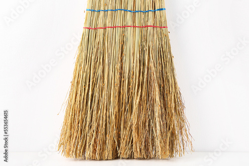 Cleaning broom isolated on white background, closeup © Pixel-Shot