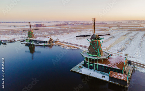 Canvas Print Zaanse Schans windmill village during winter with snow landscape in the Netherla