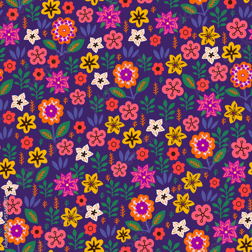 Amazing seamless floral pattern with bright multicolored flowers and leaves on a purple background. An elegant template for fashionable prints. Modern floral background. Folk style.