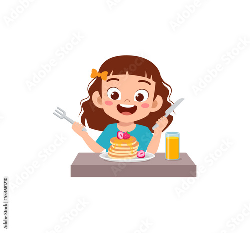 little kid eat pancake and feel happy
