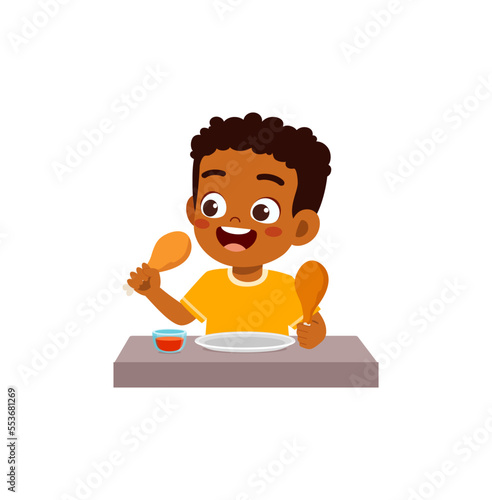 little kid eat chicken drumstick and feel happy