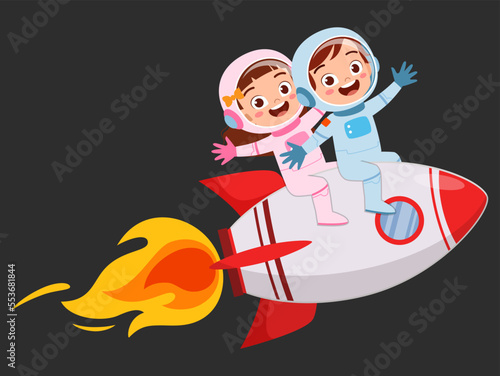 little kid wearing astronaut costume and riding spaceship