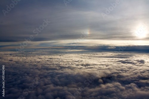 clouds seen from above with sunlight form the sun off frame