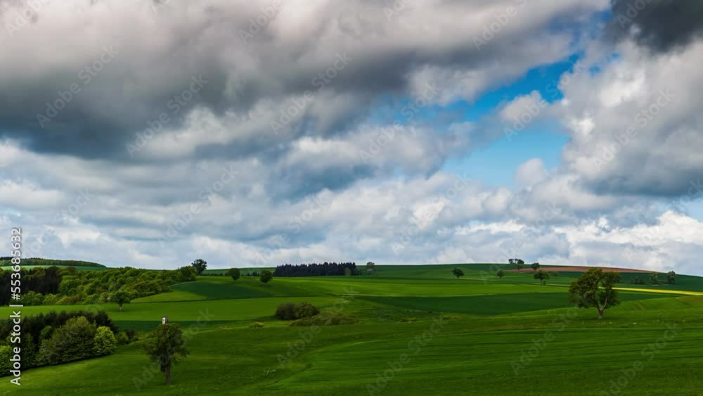 time lapse of idyllic meadow and clouds time lapse of idyllic meadow and clouds