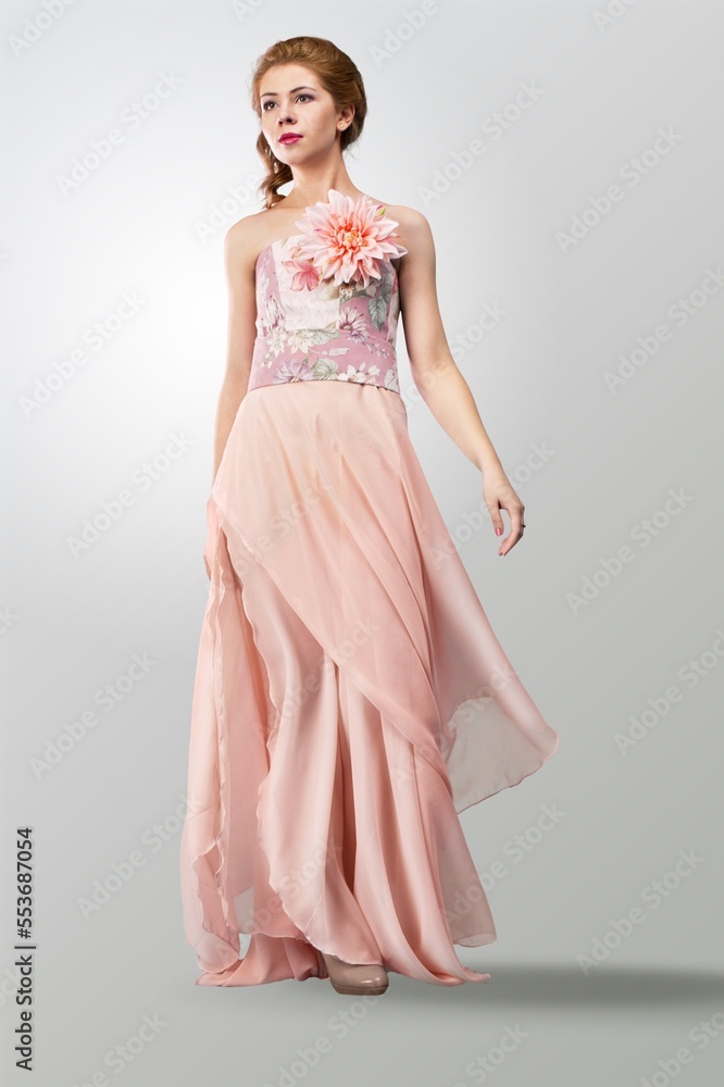 Beautiful young woman posing in dress Beautiful young woman posing in dress