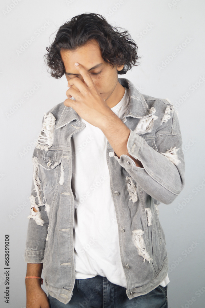 Sad man standing over white background Sad man standing over white background