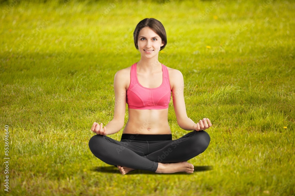 Beautiful woman doing yoga relaxed in the park Beautiful woman doing yoga relaxed in the park