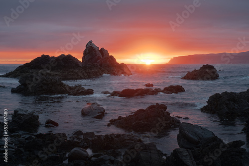 Sunrise over the seashore with cliffs. Nature morning autumn sea background. Durness, Scotland