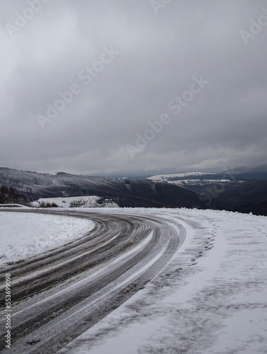 Snowy mountain road in winter