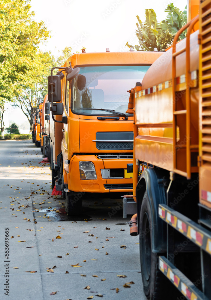 Street sweepers are cleaning city street Street sweepers are cleaning city street