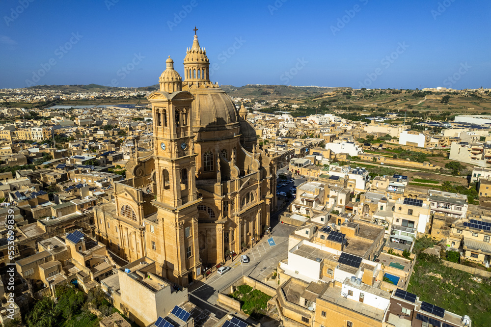 Rotunda St. John Baptist Church in the town of Xewkija, Gozo, Malta. Aerial drone view