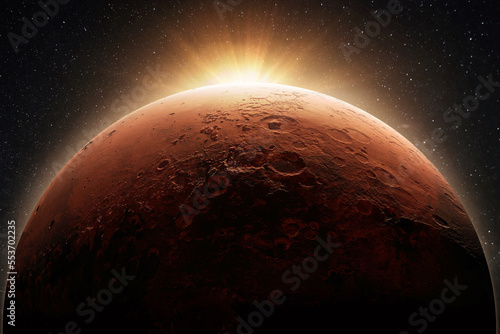 Fototapeta Naklejka Na Ścianę i Meble -  Beautiful red planet mars with craters with dawn light sun. Space concept and new home planet