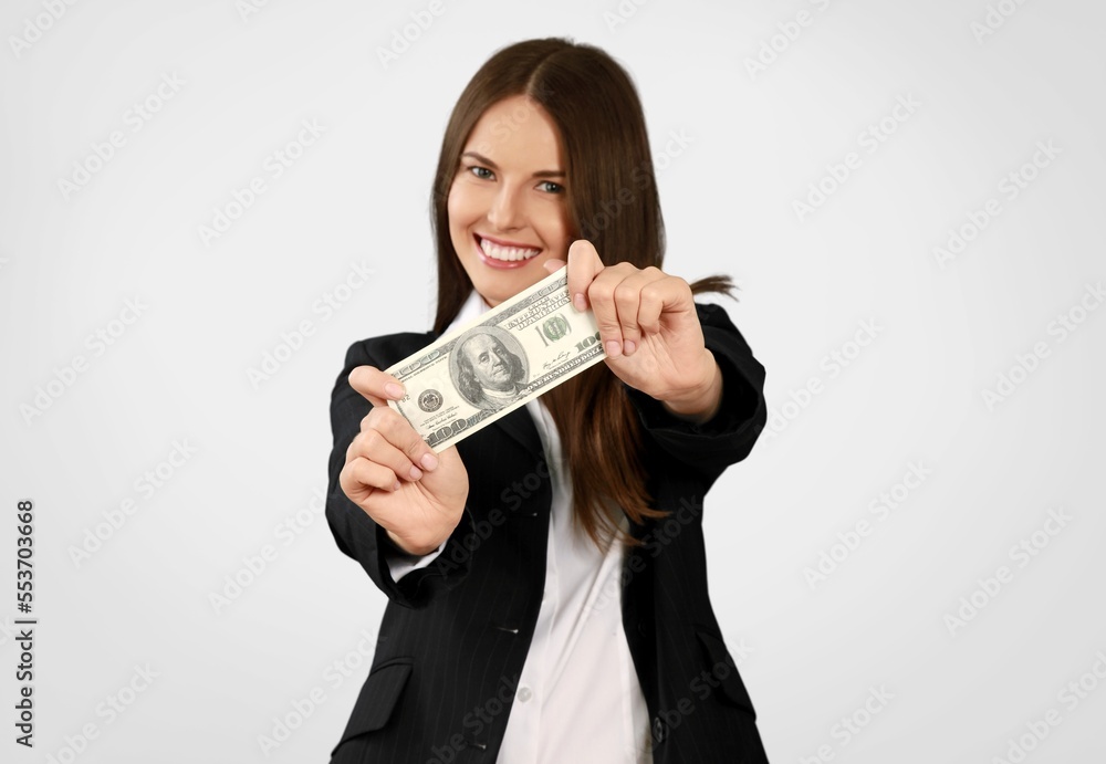 Smiling young woman with money bills Smiling young woman with money bills