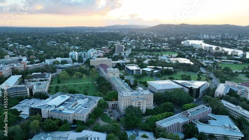 Drone shot of University of Queensland UQ St Lucia, Rotational Shot During Sunset, with Campus Buildings, Sports Fields, Forgan Smith Building, Great Court and Brisbane River in shot. BNE UNI 4K photo