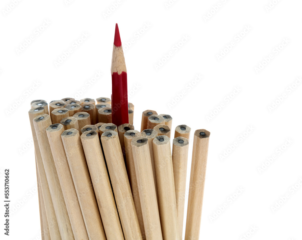 One red pencil standing out from the brown pencils One red pencil standing out from the brown pencils